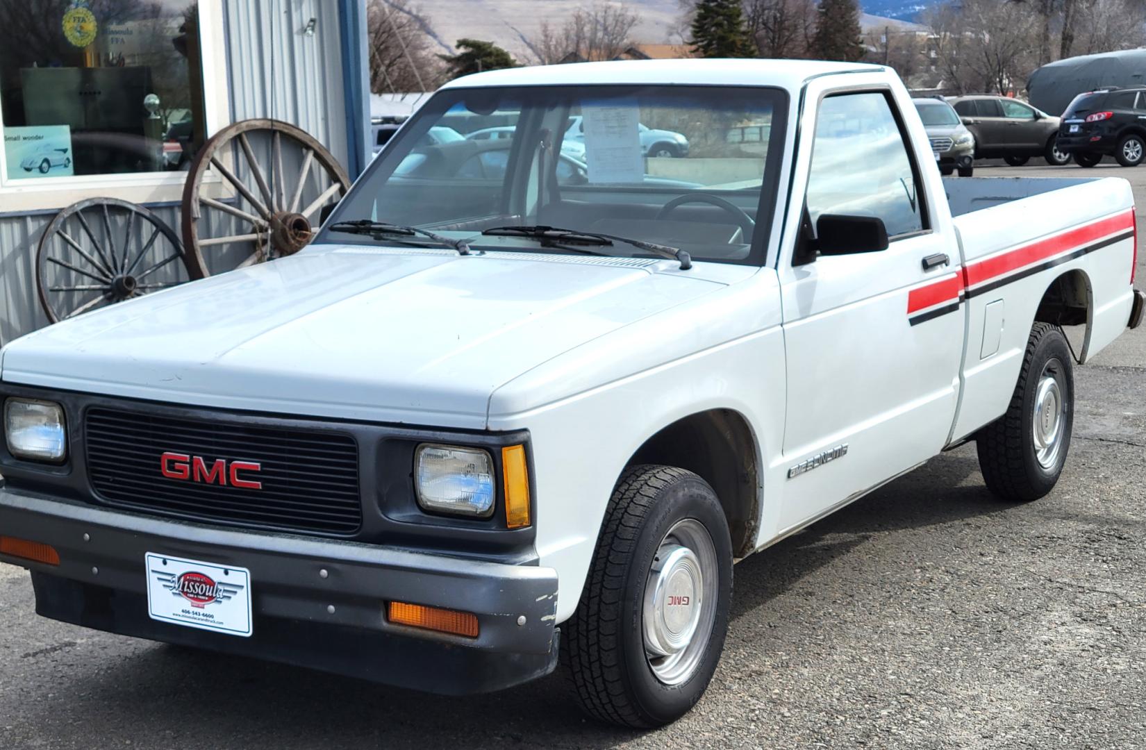 1991 White /Red GMC Sonoma Special (1GTCS14E9M8) with an 2.5L I4 engine, 5 Speed manual transmission, located at 450 N Russell, Missoula, MT, 59801, (406) 543-6600, 46.874496, -114.017433 - 2.5L I4 Engine. 5 Speed Manual Transmission. Runs and Drives well. Financing NOT Available on this Vehicle. - Photo#8